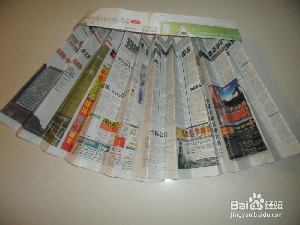 旧报纸怎么做时装