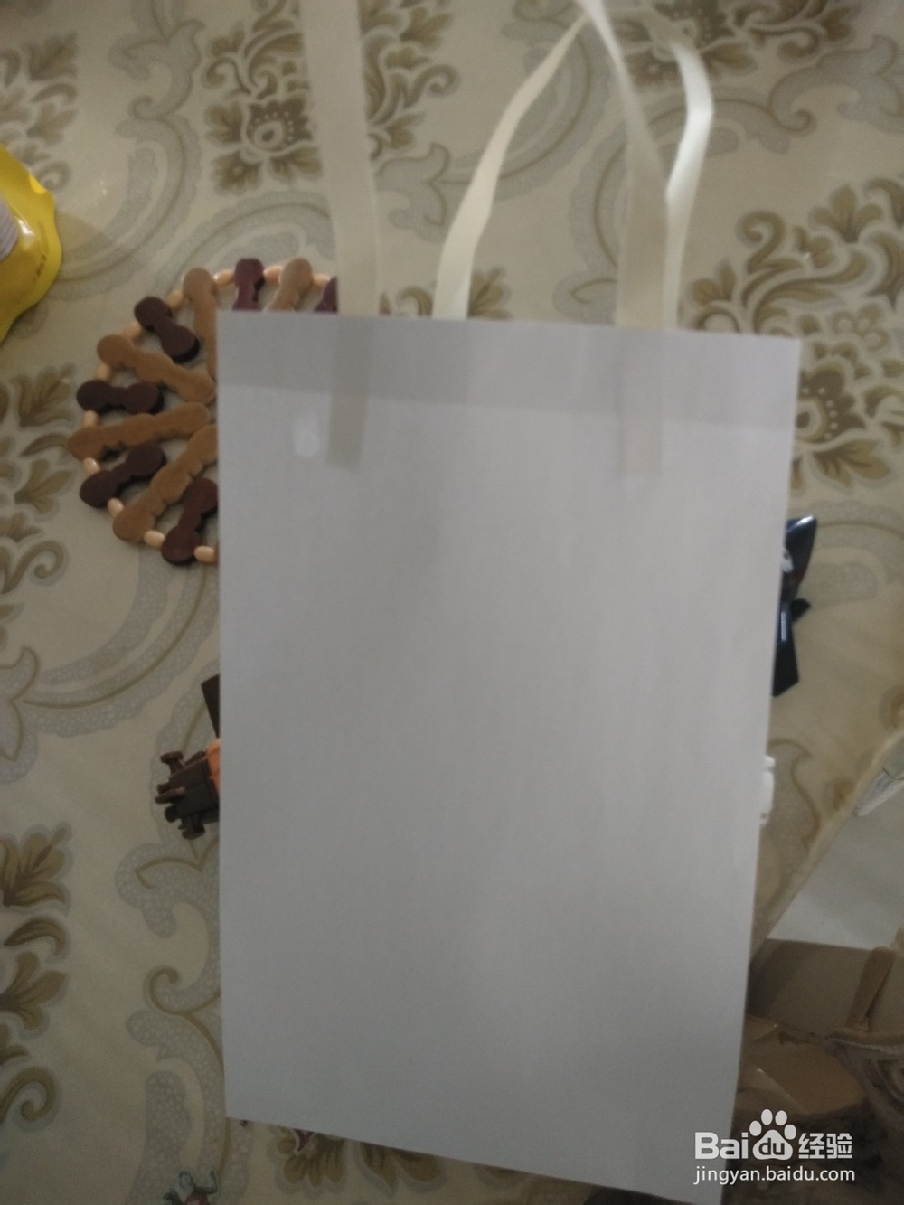 幼儿园手工怎么用A4纸做环保购物袋