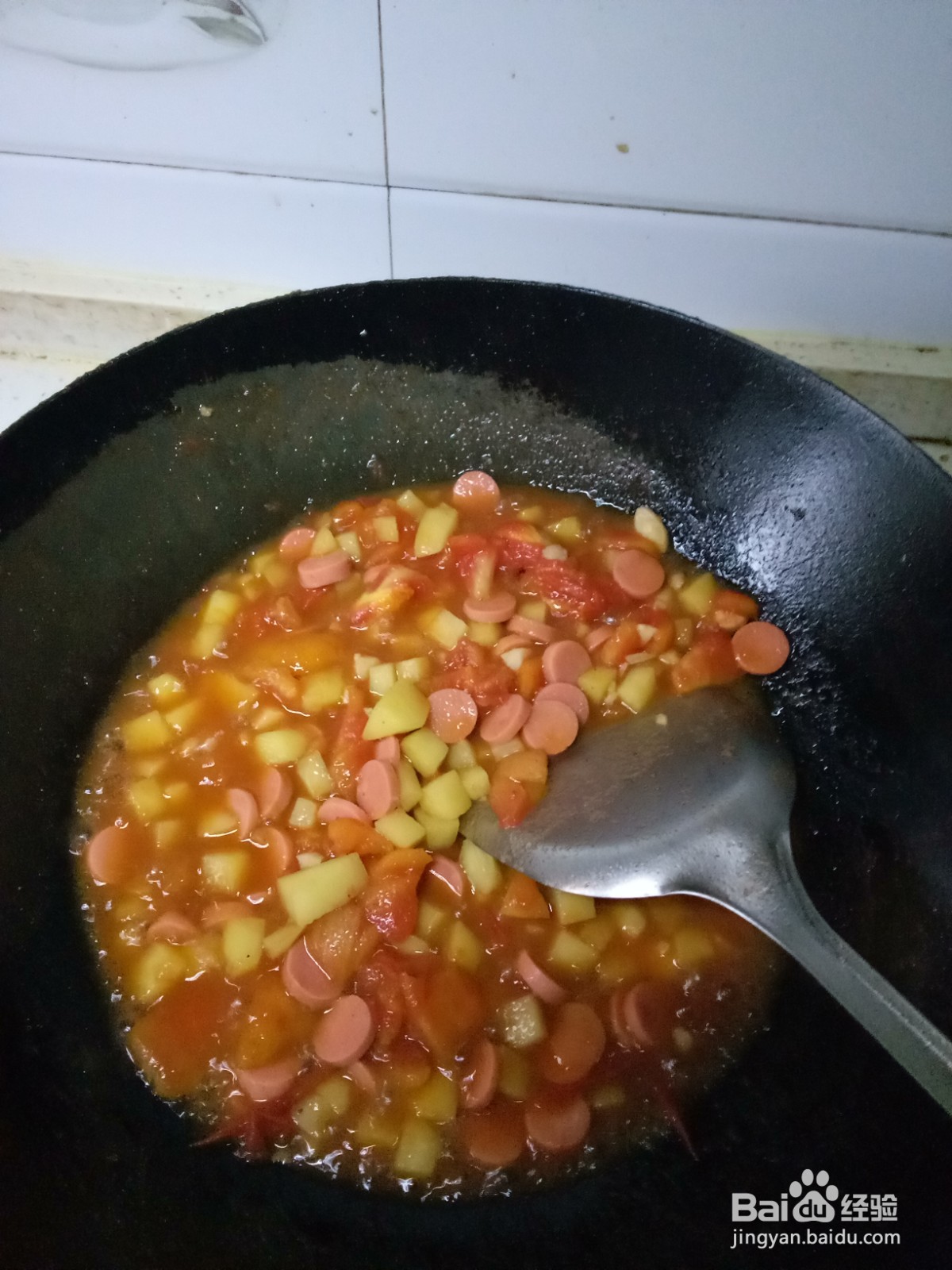西红柿炒土豆火腿肠