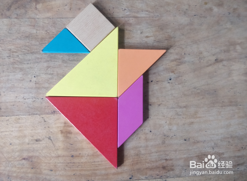 用七巧板怎样拼一只兴奋拍打鳍肢的企鹅?