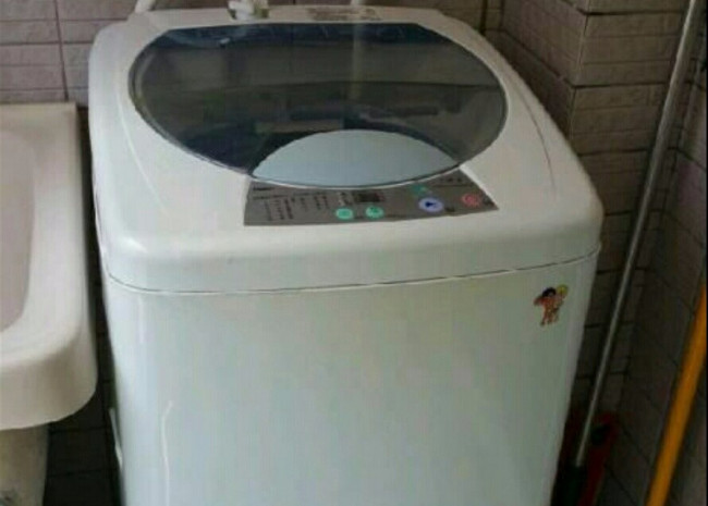 海尔滚筒洗衣机脱水声音像打鼓一样是什么问题