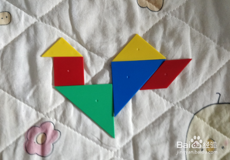 用七巧板智力拼图怎么拼一只长尾观赏鸡？