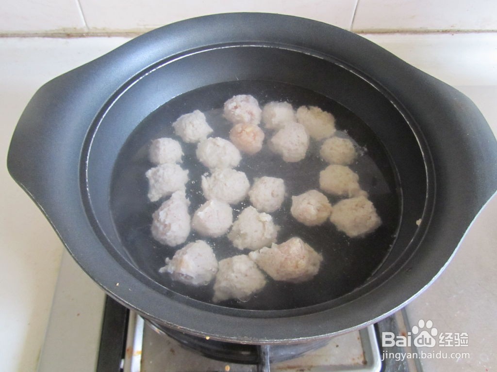 草菇焖鸡丸的做法