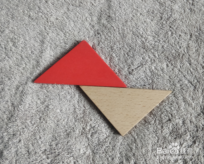 用七巧板怎样拼一个扮乌龟翻倒的幼儿呢?