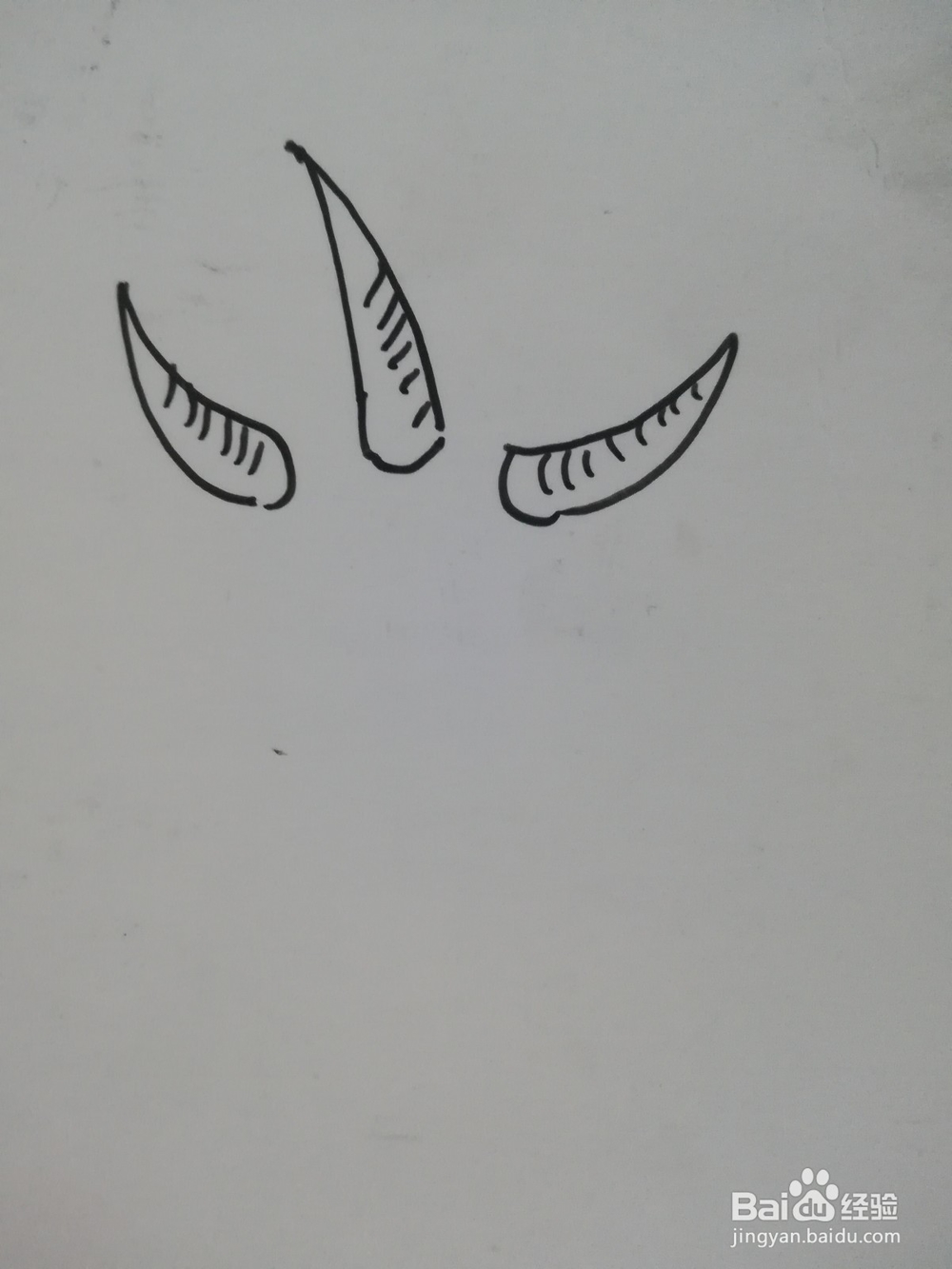 怎么画三只角的怪物简笔画