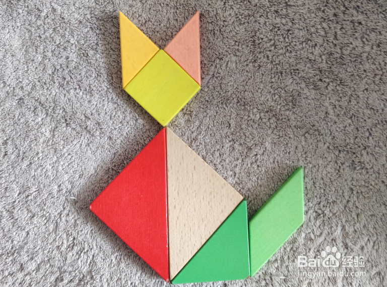 坐着的小猫用七巧板怎么拼