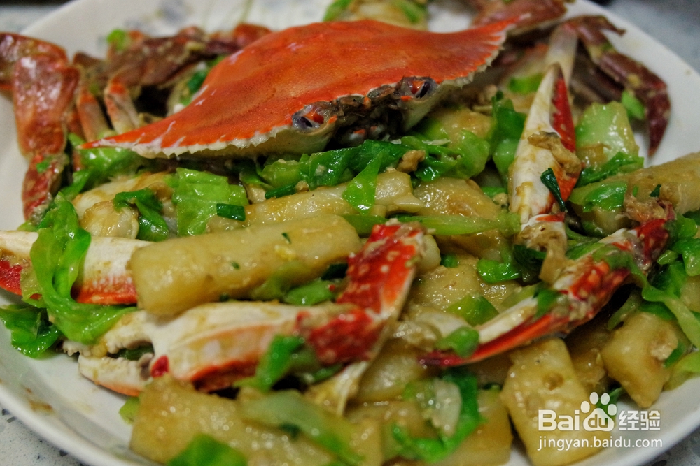 自己做梭子蟹炒年糕海鲜美食