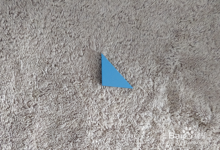 用九巧板拼图玩具怎样拼一只安静站着的鸽子?