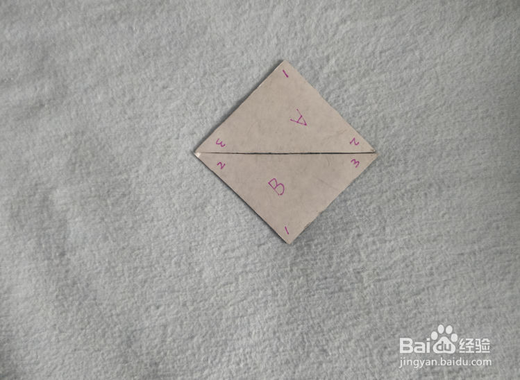 用七巧板怎样拼一只天上的风筝？