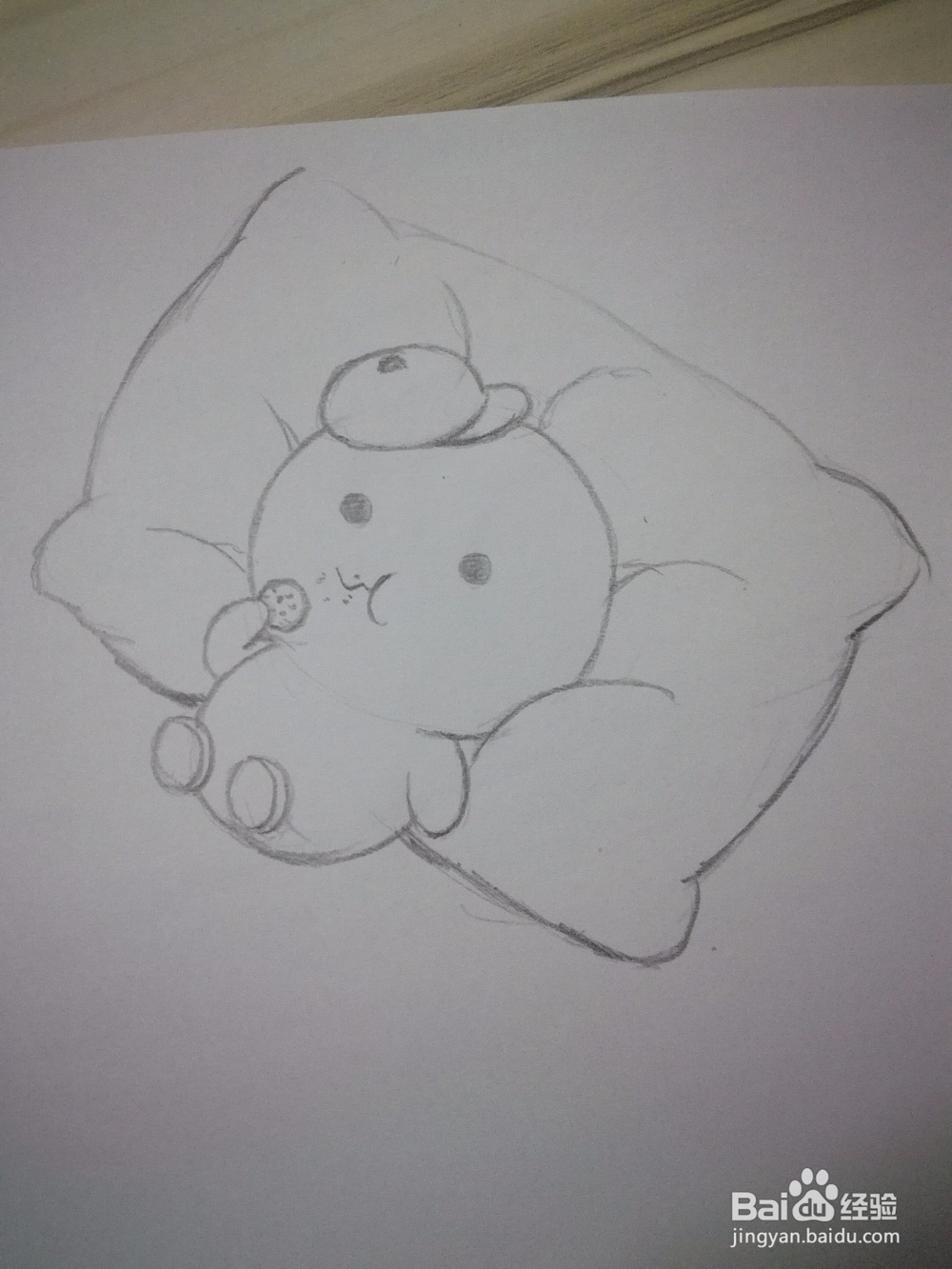<b>怎么画躺在靠枕上吃饼干的小动物简笔画</b>