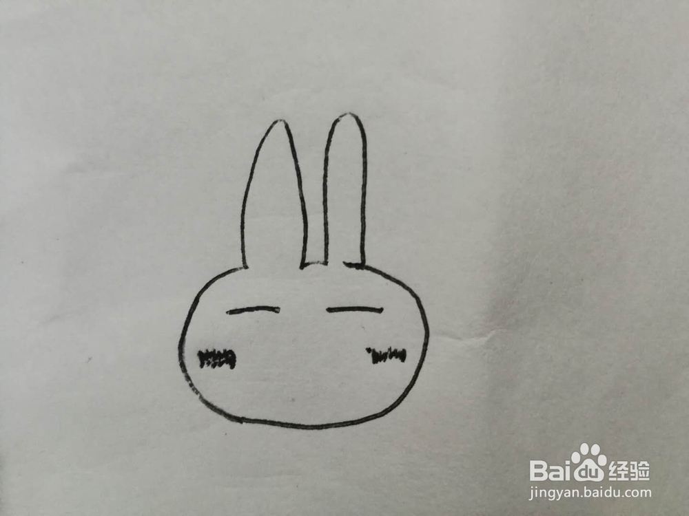 简笔画无奈的兔子