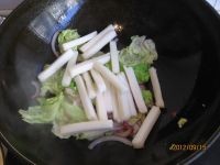 馋舌头炒年糕做法