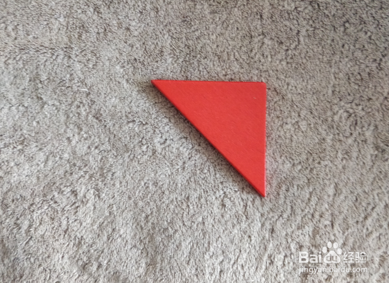 驾驶摩托艇的小哥哥用七巧板怎么拼