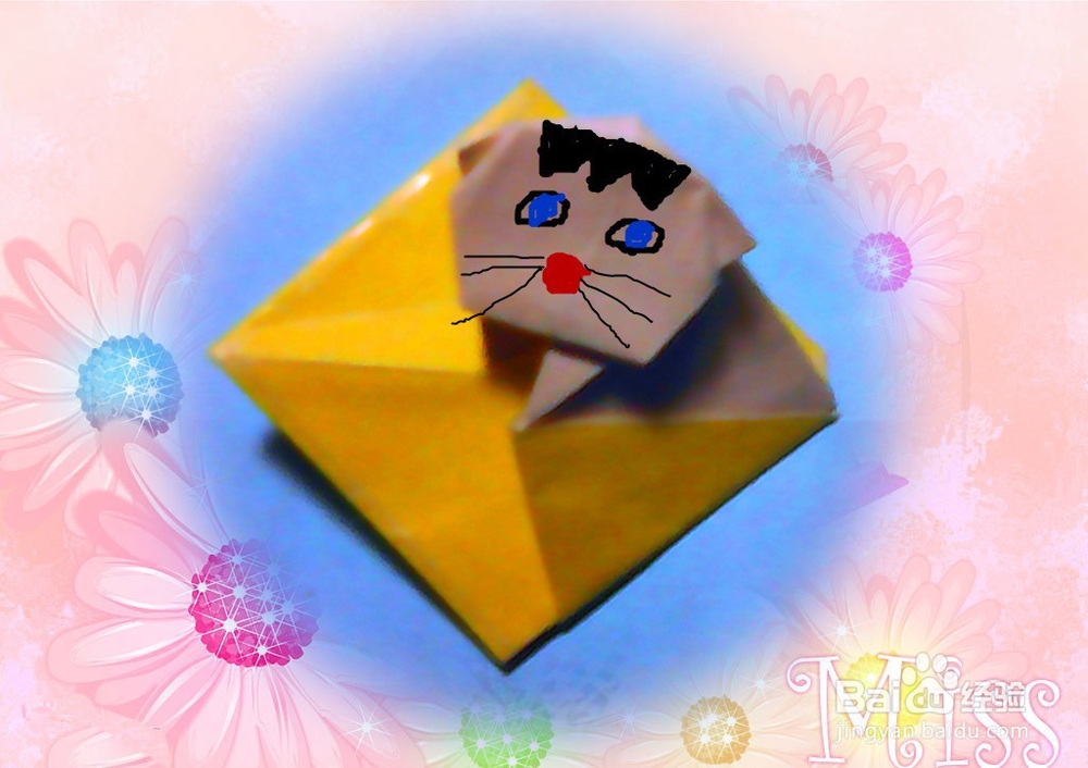 有趣的折纸——坐在垫子上的小猫