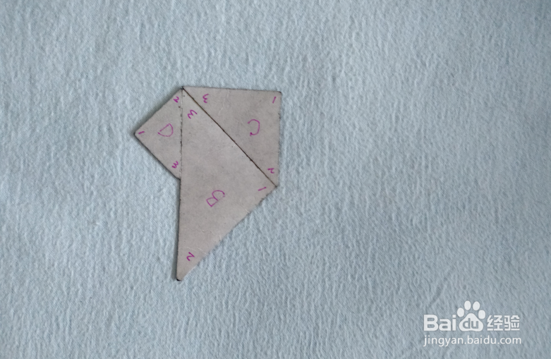 用七巧板怎样拼一只小狮子狗?