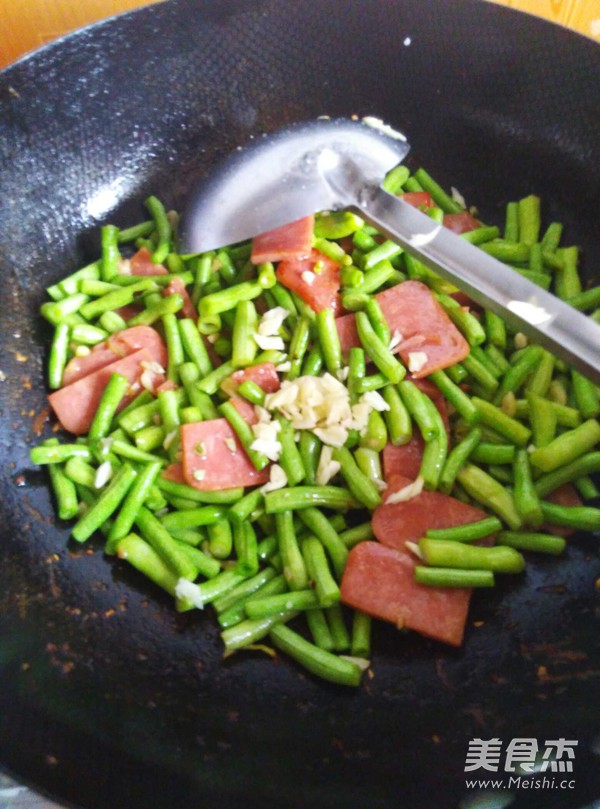 豆角炒火腿的做法