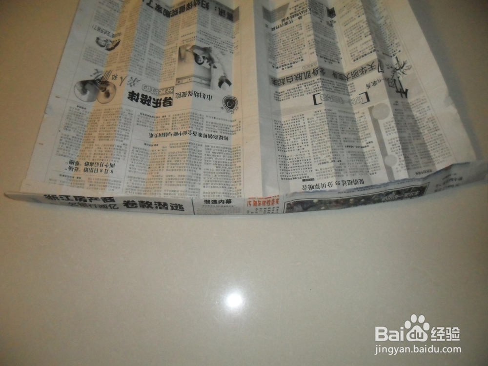 旧报纸怎么做时装