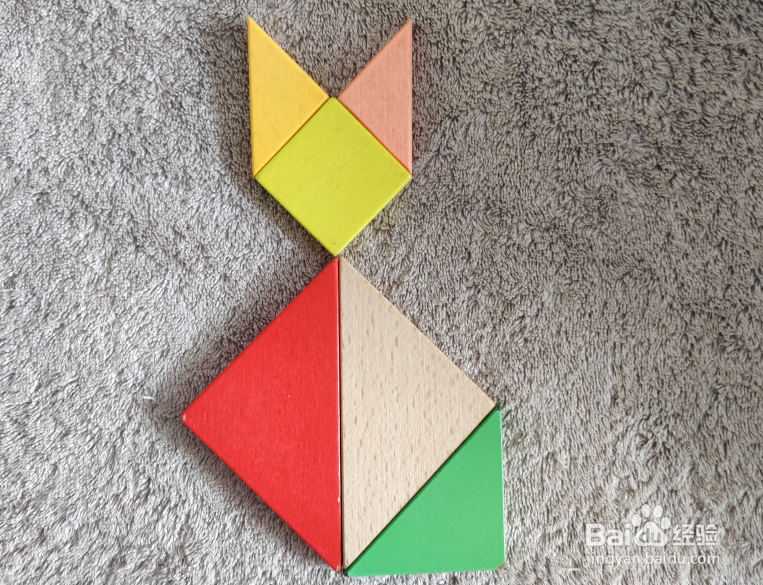 坐着的小猫用七巧板怎么拼