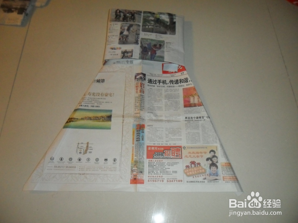 旧报纸怎么做时装