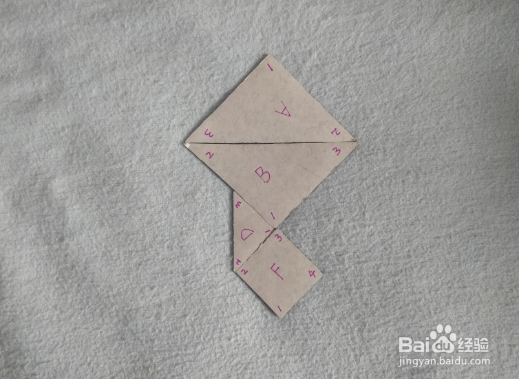 用七巧板怎样拼一只天上的风筝？