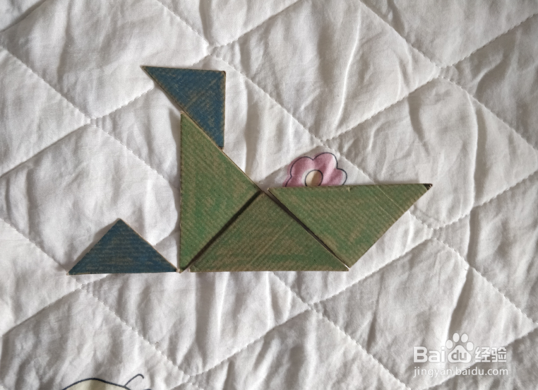 用九巧板怎么拼一个打滚哭闹的小朋友呢?