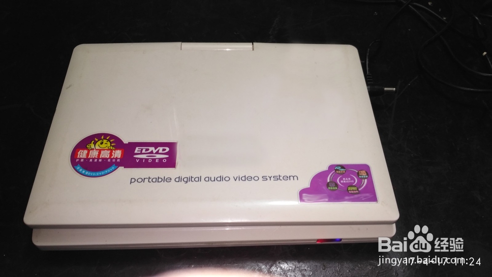 移动DVD机充不进电不开机音量失控故障维修经验